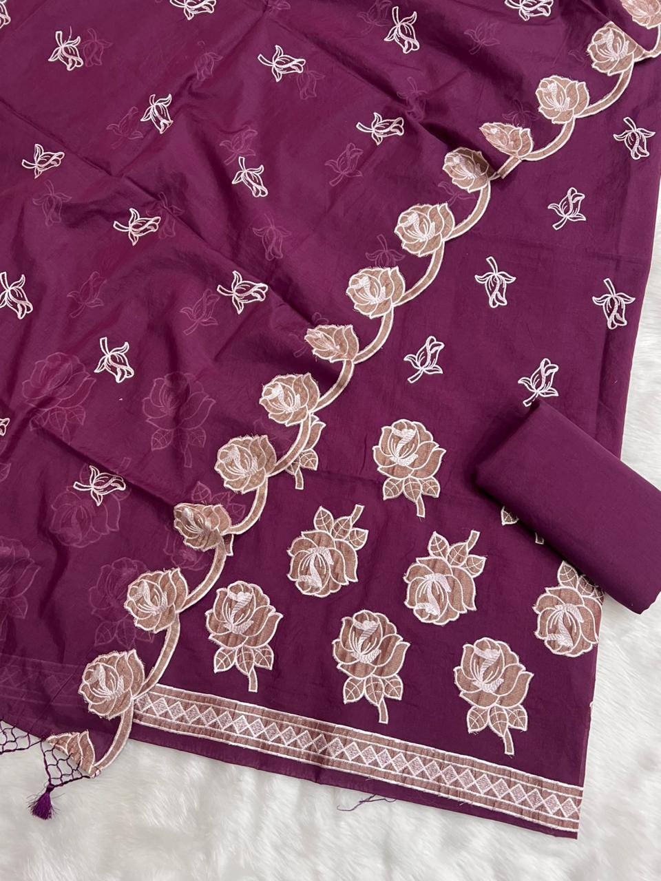 premium mul applique embroidered unstitched suit.
